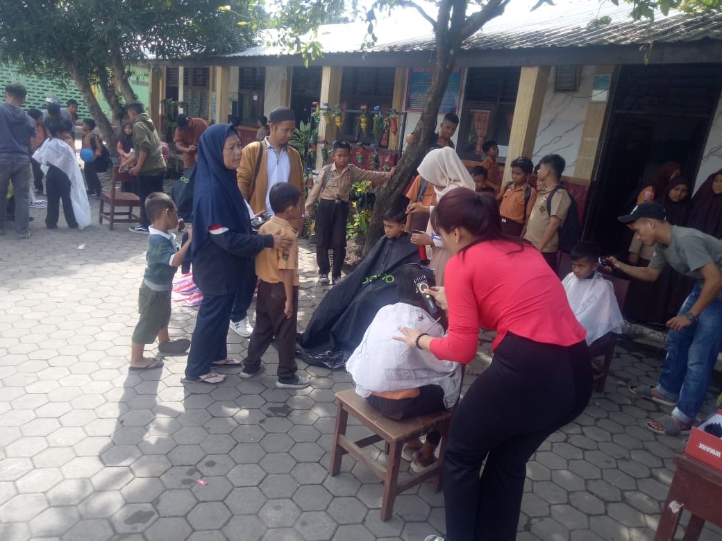 SD Negeri 068085 Ajak FORMEBI Melaksanakan Pangkas Gratis
