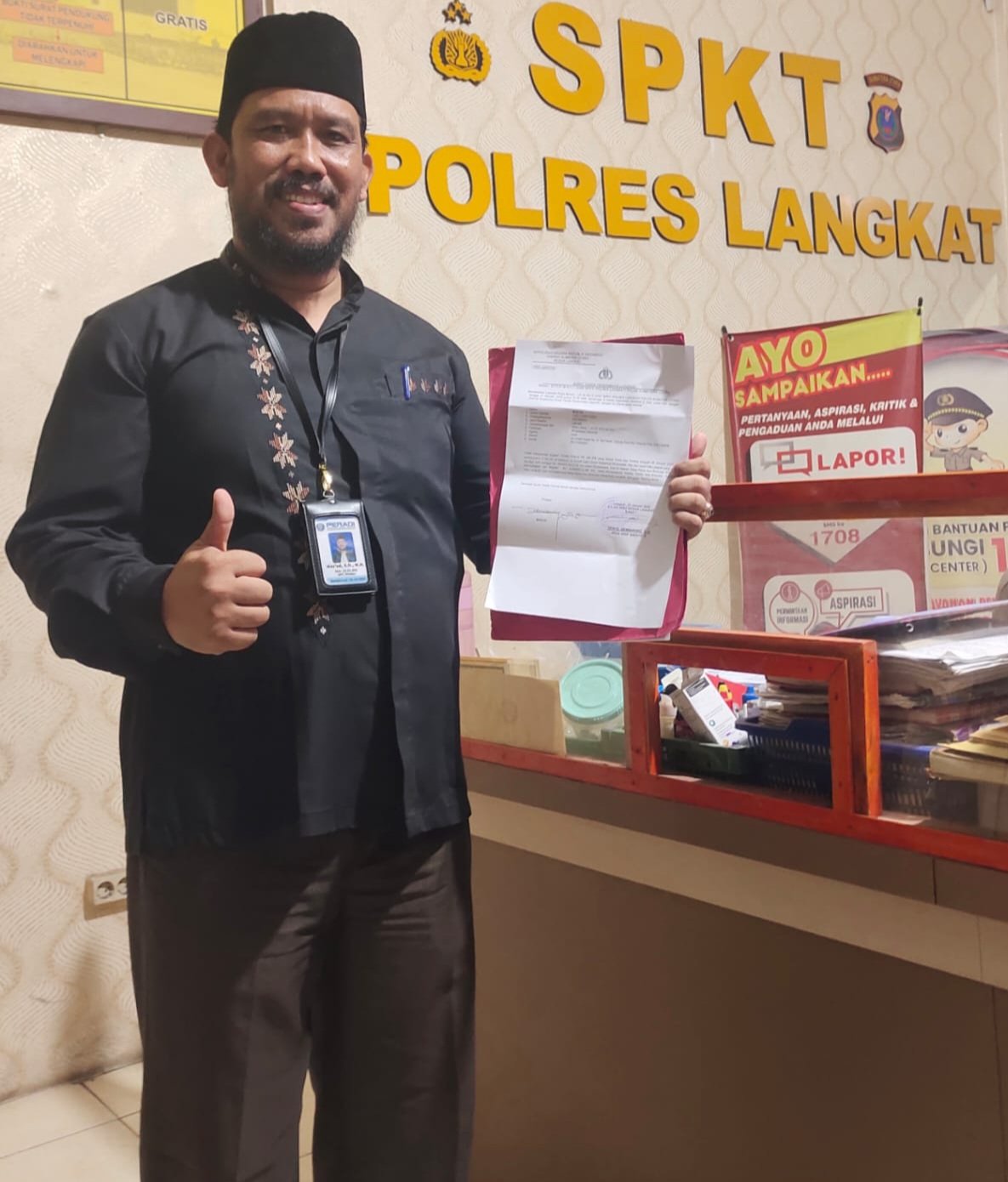 Terjerat Dugaan Tindak Pidana UU ITE, Ketua BPD Desa Perlis Kecamatan Brandan Barat Dilapor ke Polres Langkat