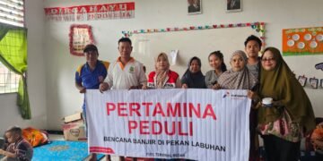 Respons Cepat Pertamina Patra Niaga Regional Sumbagut Bantu Warga Pekan Labuhan Pasca Luapan Sungai Deli