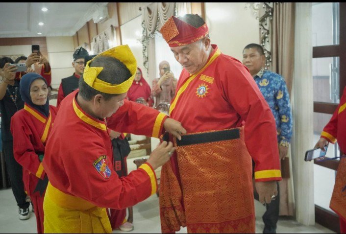 Momentum Milad Muhammadiyah Ke-113, Tapak Suci Kukuhkan Bupati Asahan sebagai Pendekar Madya