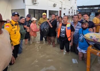 Edi Surahman dan Kader Golkar Tinjau Banjir di Tanjung Pura, Pastikan Evakuasi dan Bantuan Tepat Sasaran