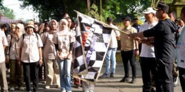 Pemkab Langkat Hadirkan May Day Harmonis, Para Buruh Meriahkan Gerak Jalan di Langkat