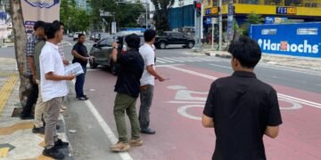 FORPEDA Langkat Tebar Poster Desak Pengusutan Dugaan Korupsi Smart Board