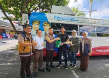 Bayar Pajak Kendaraan di Samsat Keliling Berhadiah Langsung Minyak Goreng