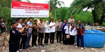 Polsek Pangkalan Susu Bangun Jembatan Bhayangkara Merah Putih